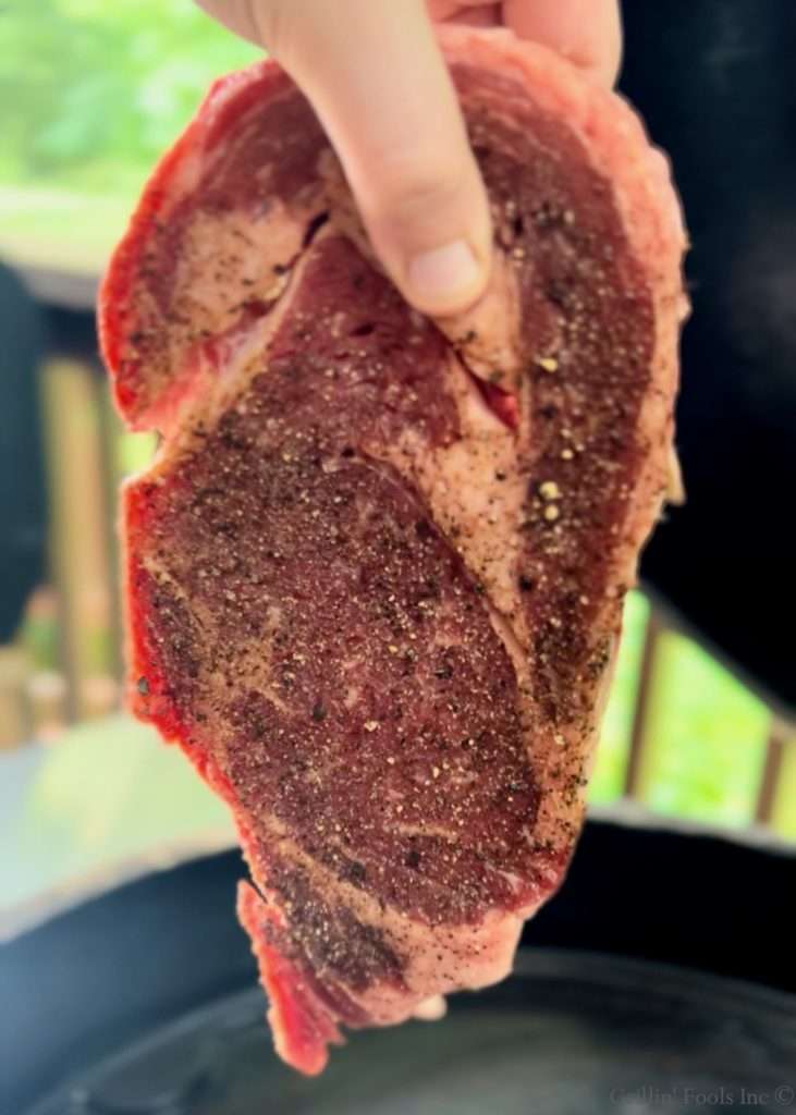 Seasoned Ribeye ready for the Cast Iron