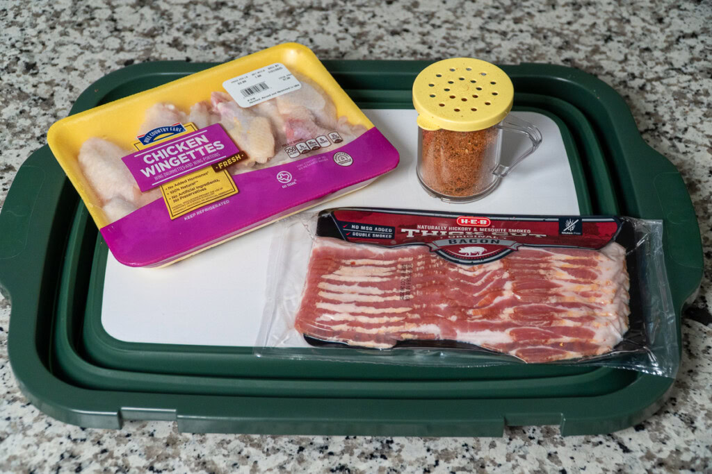 ingredients laid out for smoked bacon wrapped wings