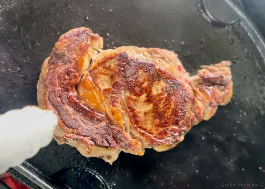 Cast Iron Ribeyes on the Grill