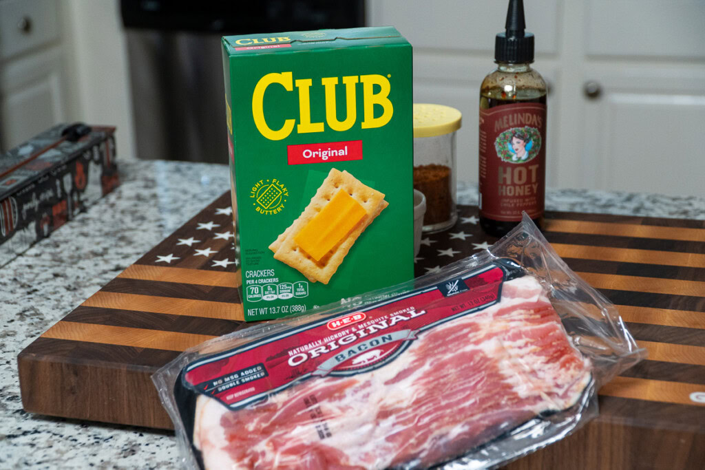 a box of club crackers and a packet of bacon