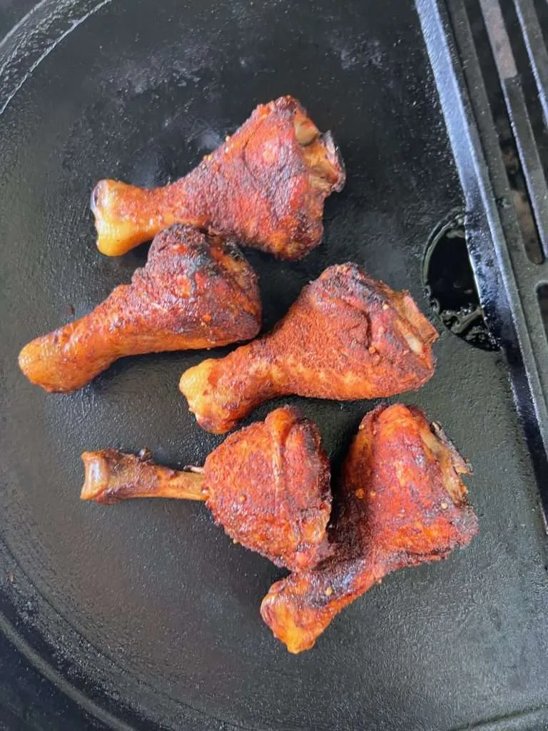 Searing Chicken Lollies on a Cast Iron Griddle