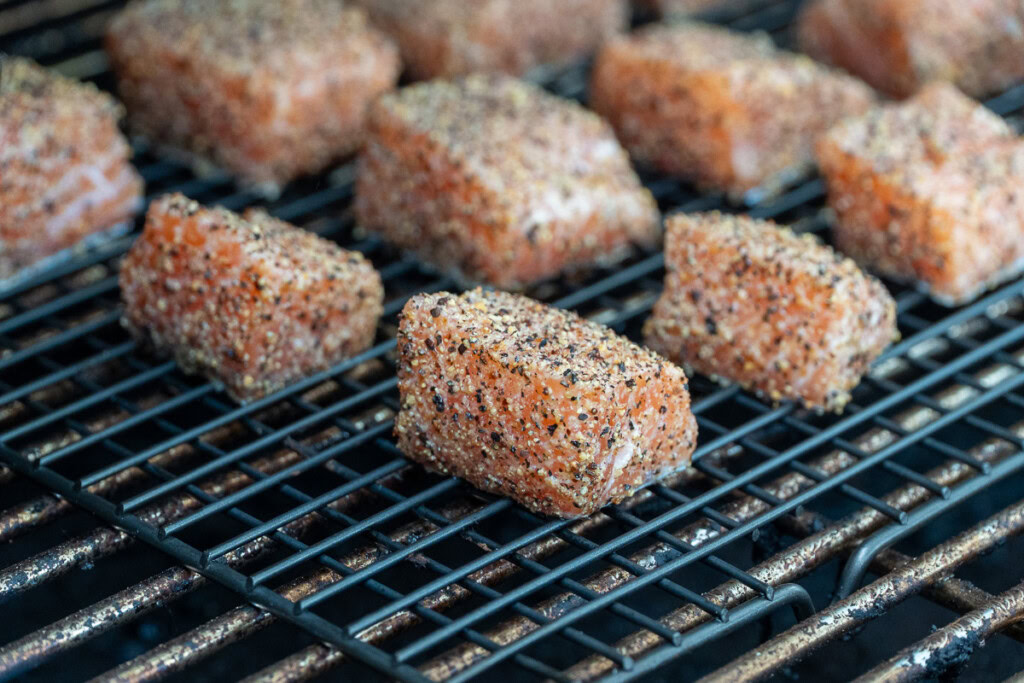 raw seasibed salmon cubes in the grilla grill