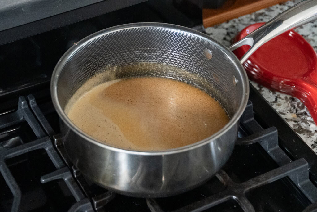 a pot with injection in it on the cook top
