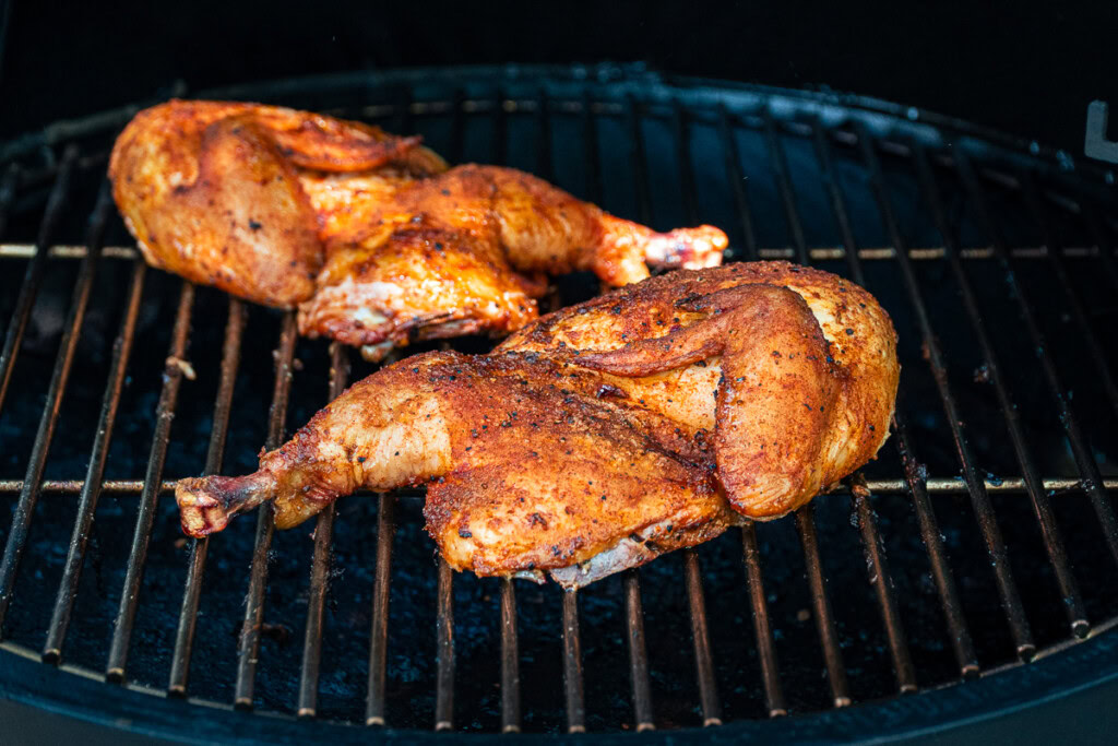 smoked half chickens on the grilla grill