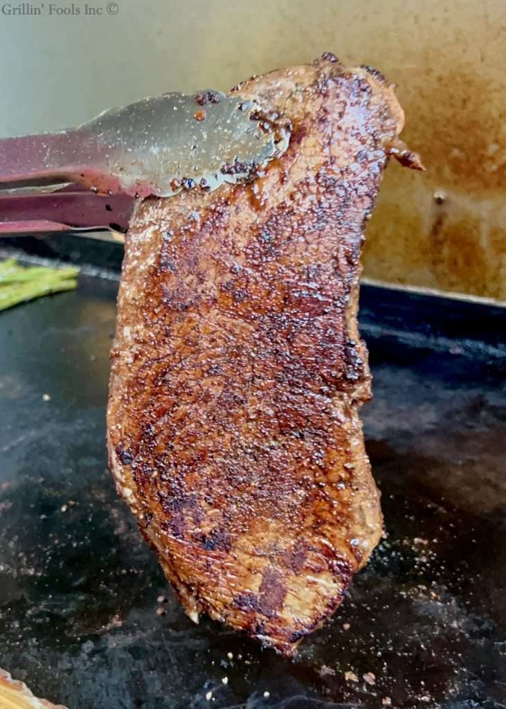 The other side of the bigger steak
