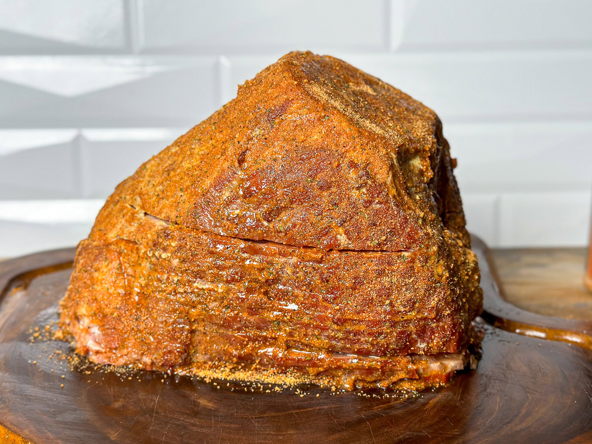 a spiral ham covered in seasoning.