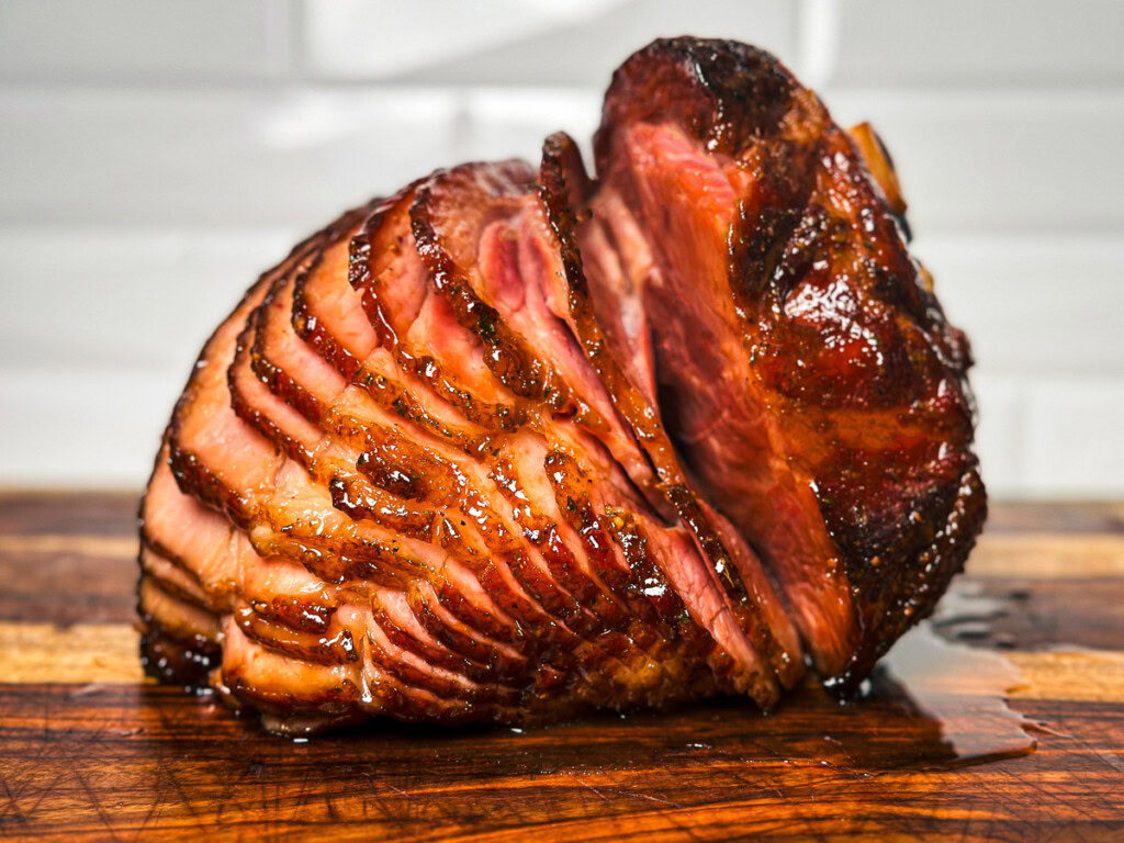 a twice smoked ham on a wooden board