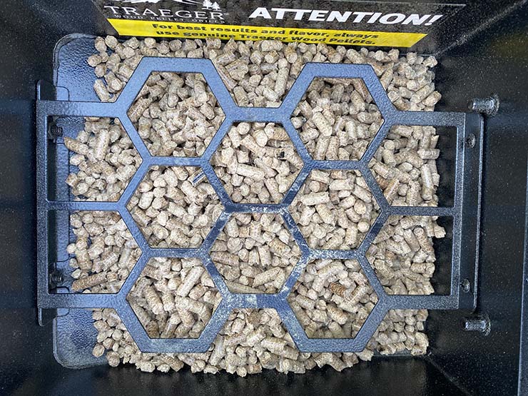 traeger pellet hopper filled with wood pellets