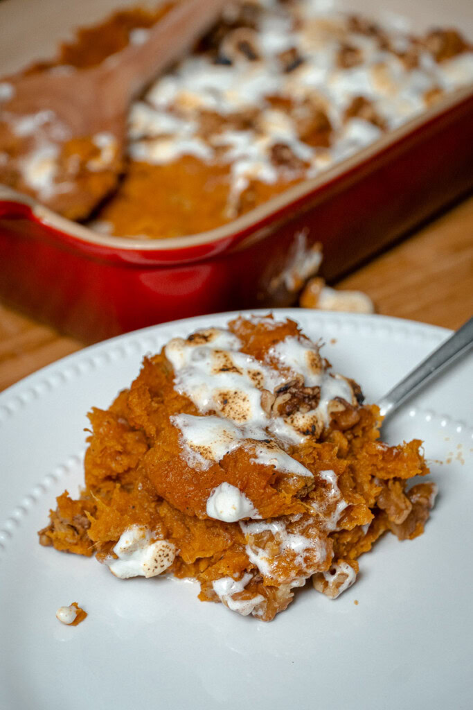 smoked sweet potato casserole on a white plate