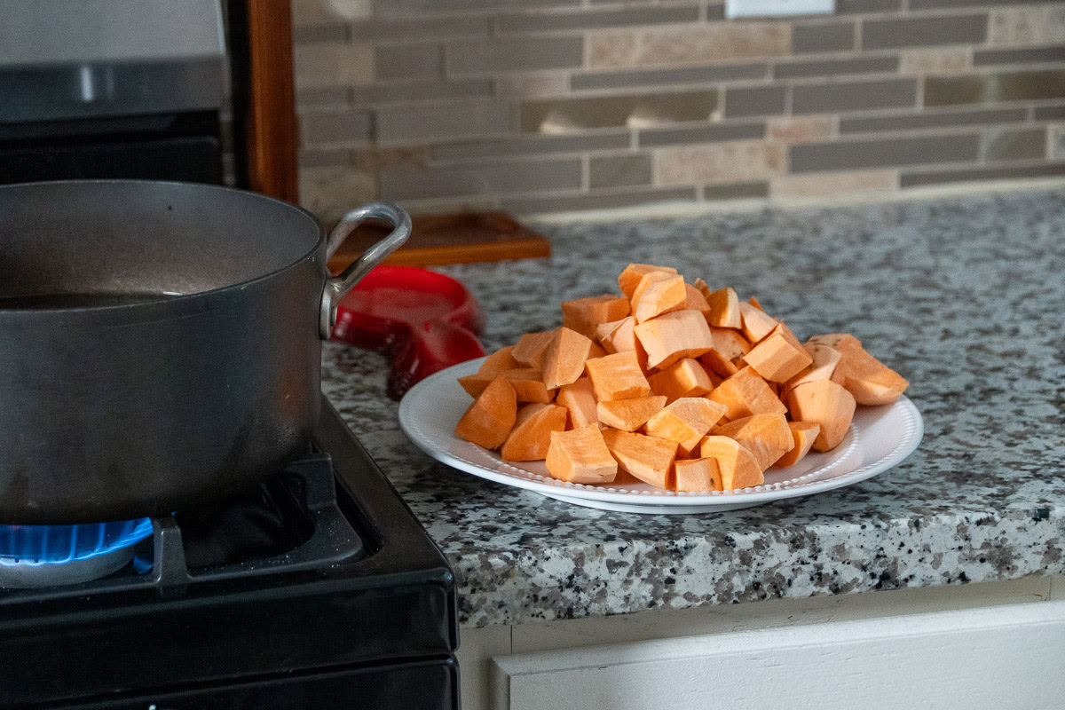 a plate of diced raw sweet potato