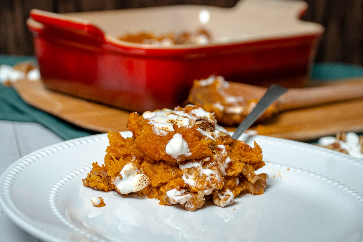 smoked sweet potato casserole on a white plate