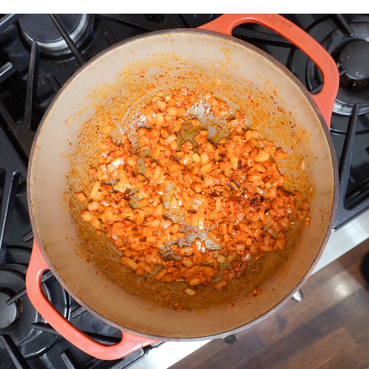 sauteed veggies in dutch oven over stove top.