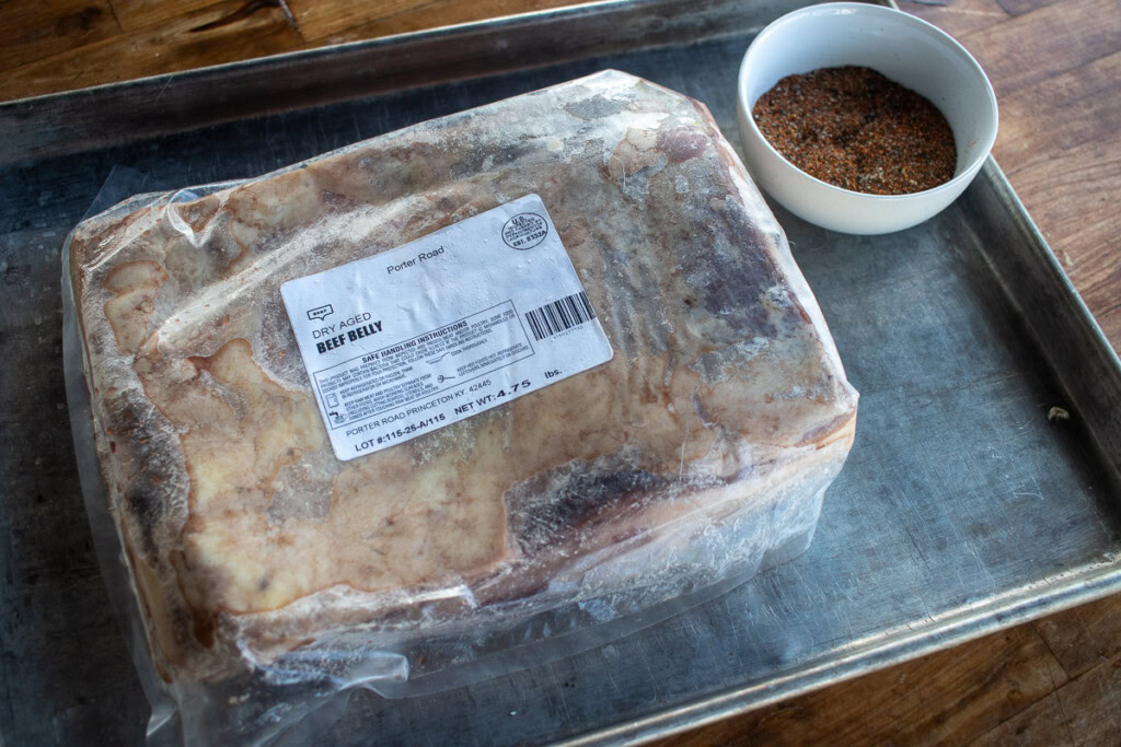 a piece of beef belly in plastic wrap from porter road butcher