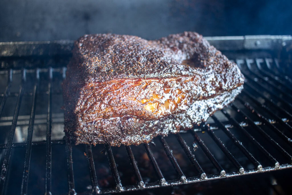 a piece of smoked beef belly at the end of the cook