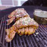 Smoked Cajun Lobster Tail on the grill.