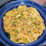 Creamy Italian Sausage Pasta in a blue dish.