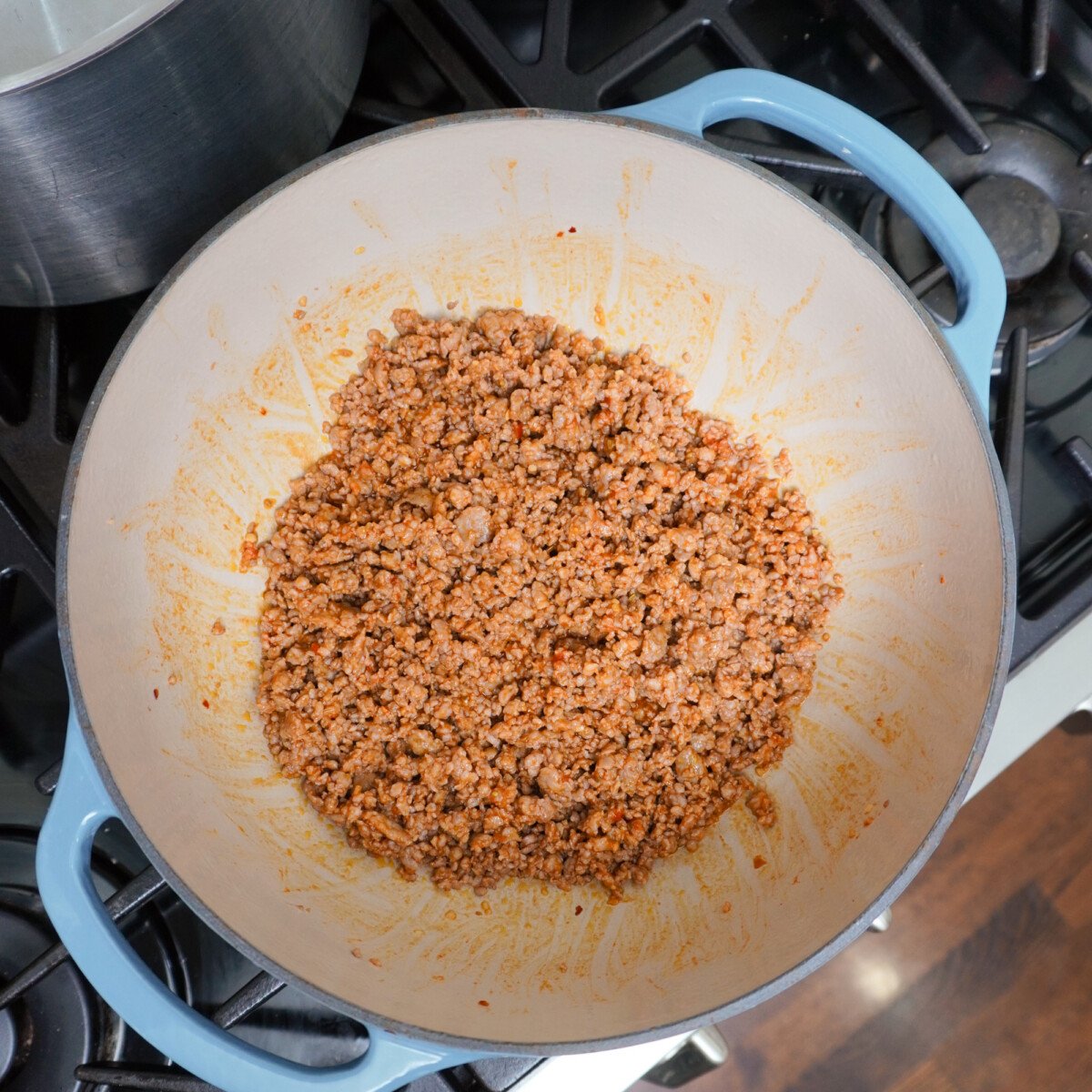Ground Italian Sausage in dutch oven.