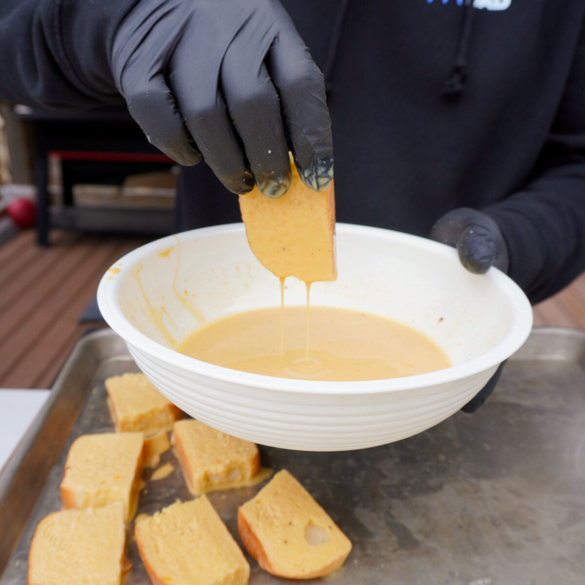 dipping bread slices in a heavy whipping cream and vanilla custard.