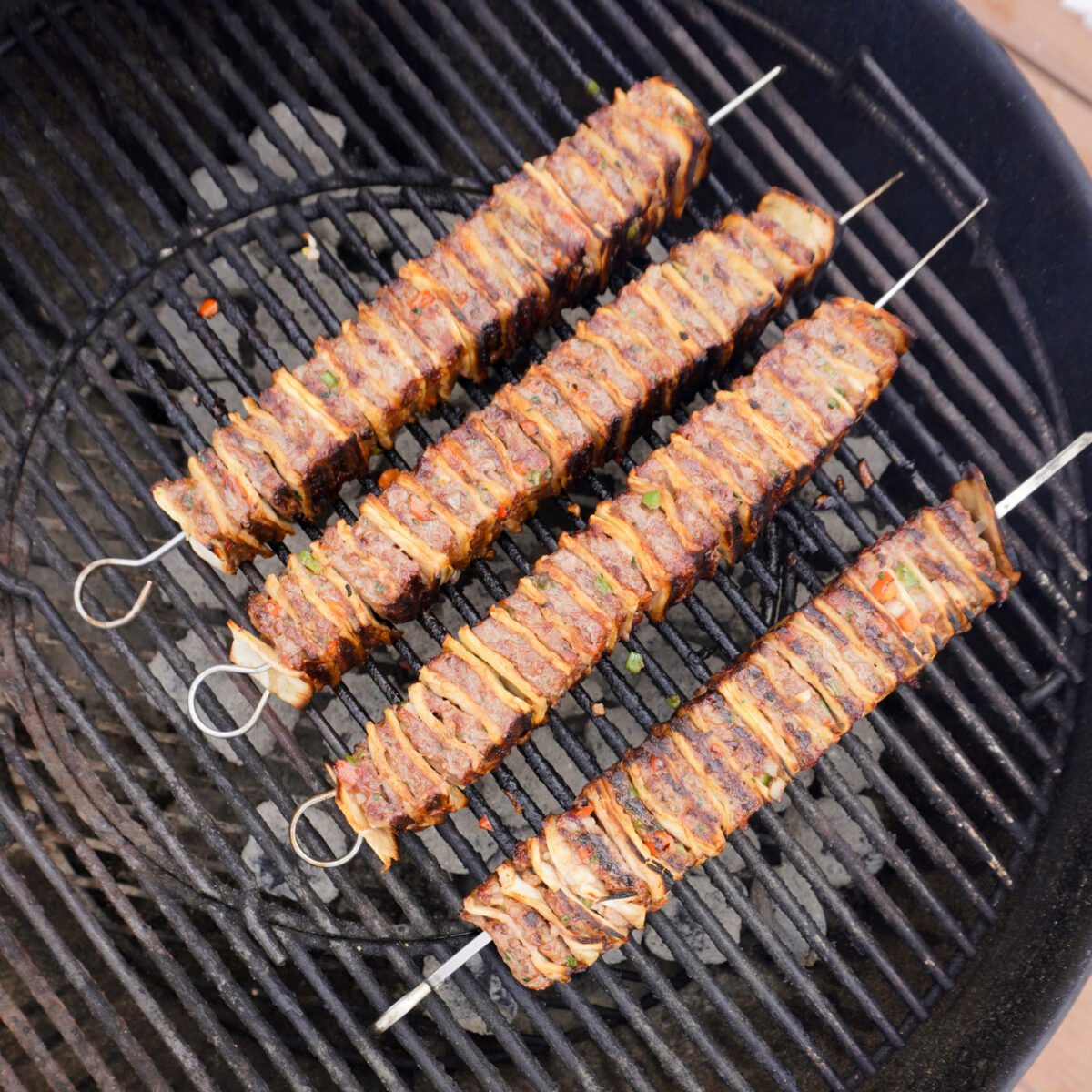 grilled tortilla beef kebabs on the grill.