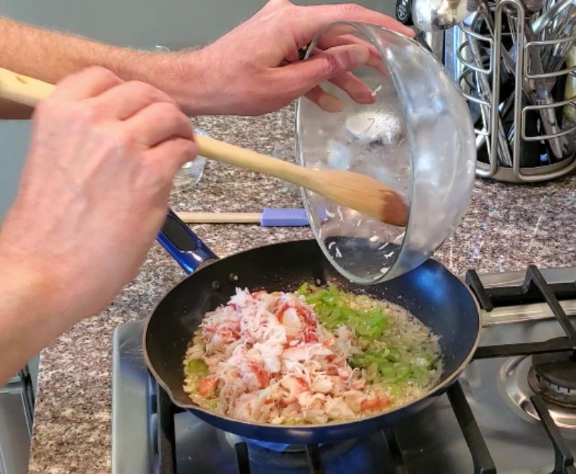 adding crab to pan step3