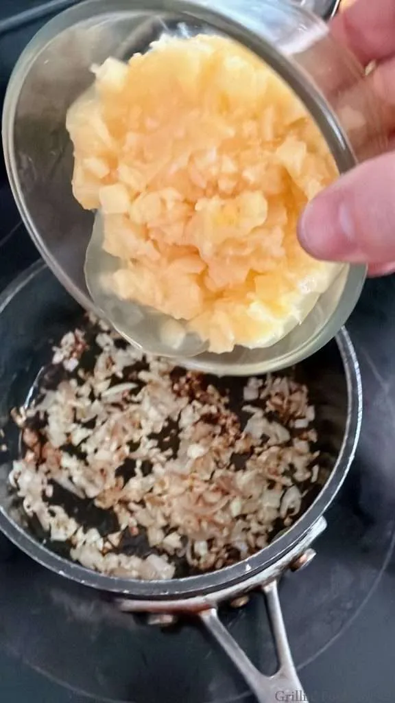 Adding crushed pineapple