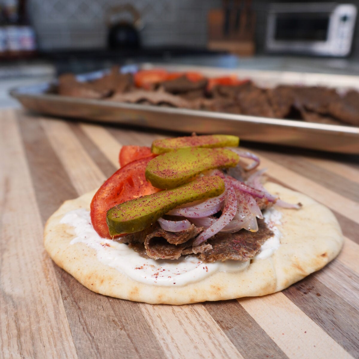 Sheet Pan Beef kebabs assembled on a cutting board.