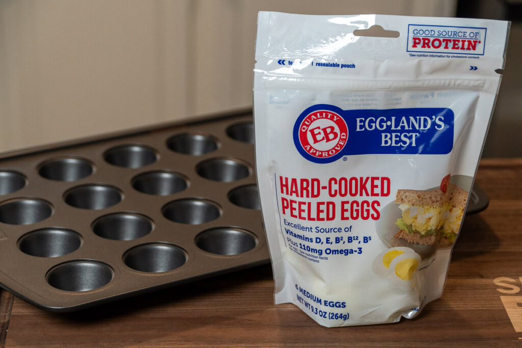 a packet of hard boiled eggs and a muffin tray