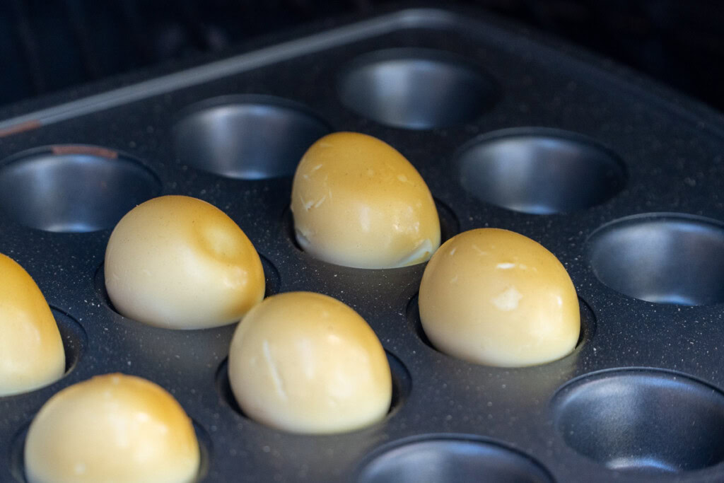 smoked boiled eggs in a muffin tray