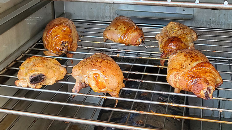 chicken thighs smoking in Smokin Tex Pro 1400