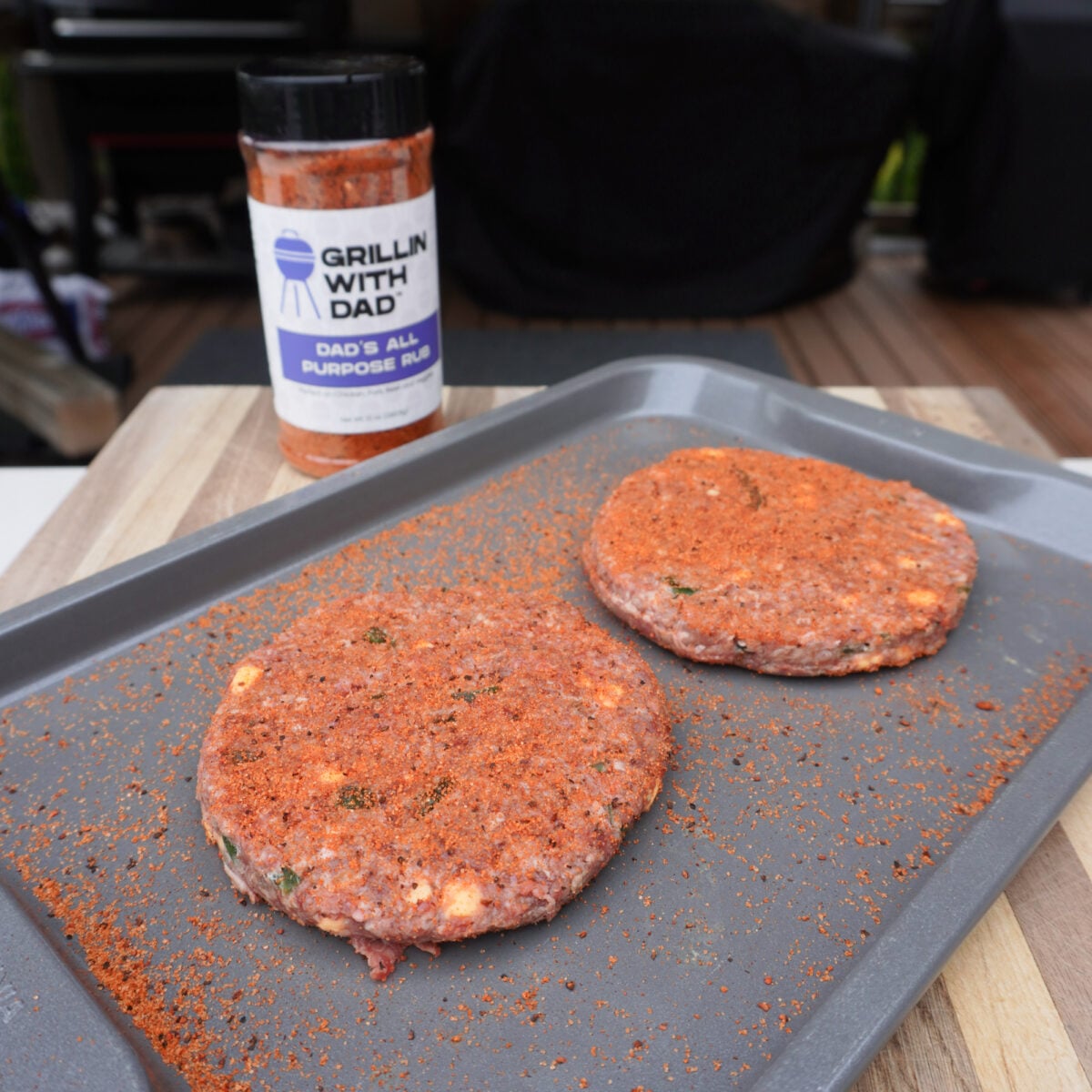 seasoned beef pub burger patties on tray.