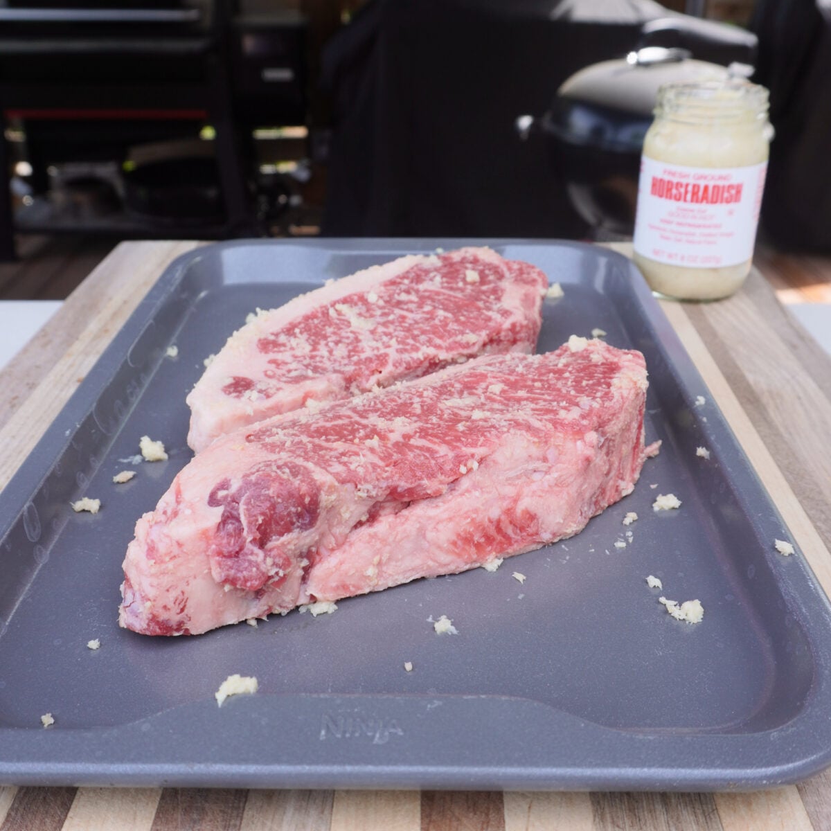 New York strip covered in fresh ground horseradish.