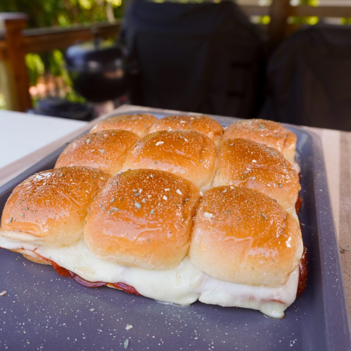 Toasted golden brown slider buns.