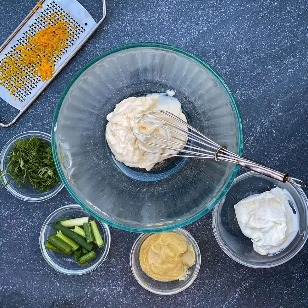 All the ingredients to create a creamy dill sauce