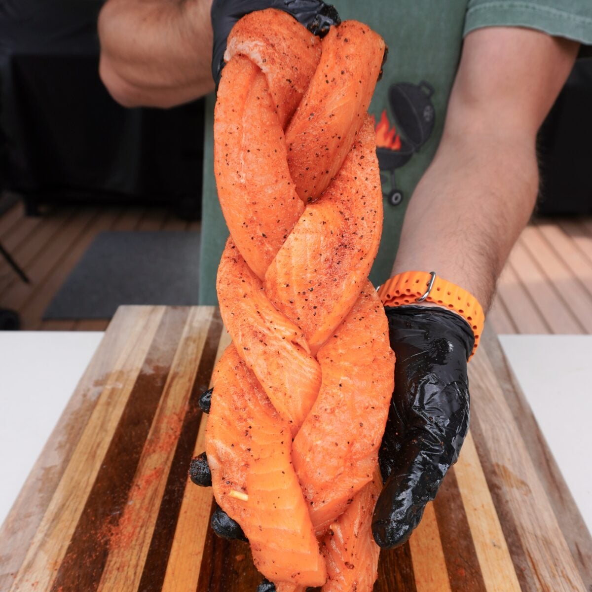 Seasoned and braided salmon.