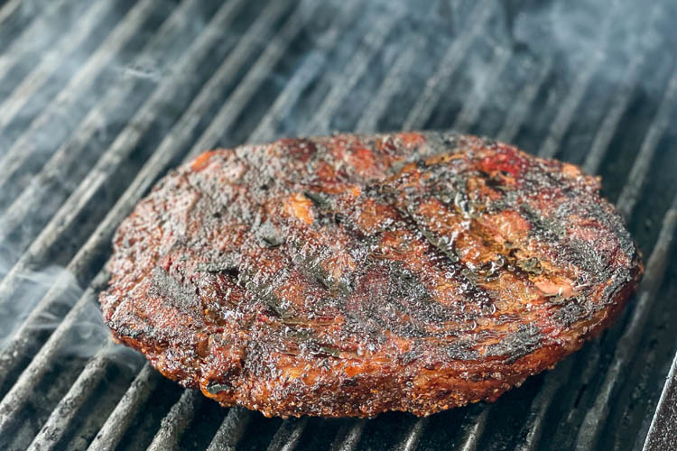 ribeye on grill at end of cooking