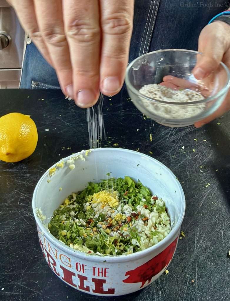 Adding salt to the chimichurri