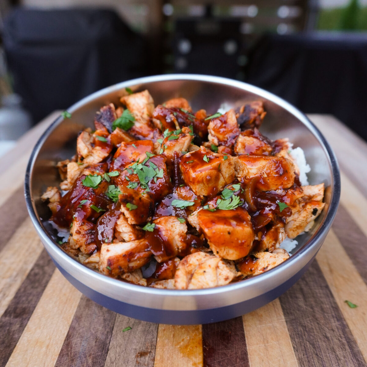 Grilled Chipotle Chicken Copycat in bowl on cutting board.