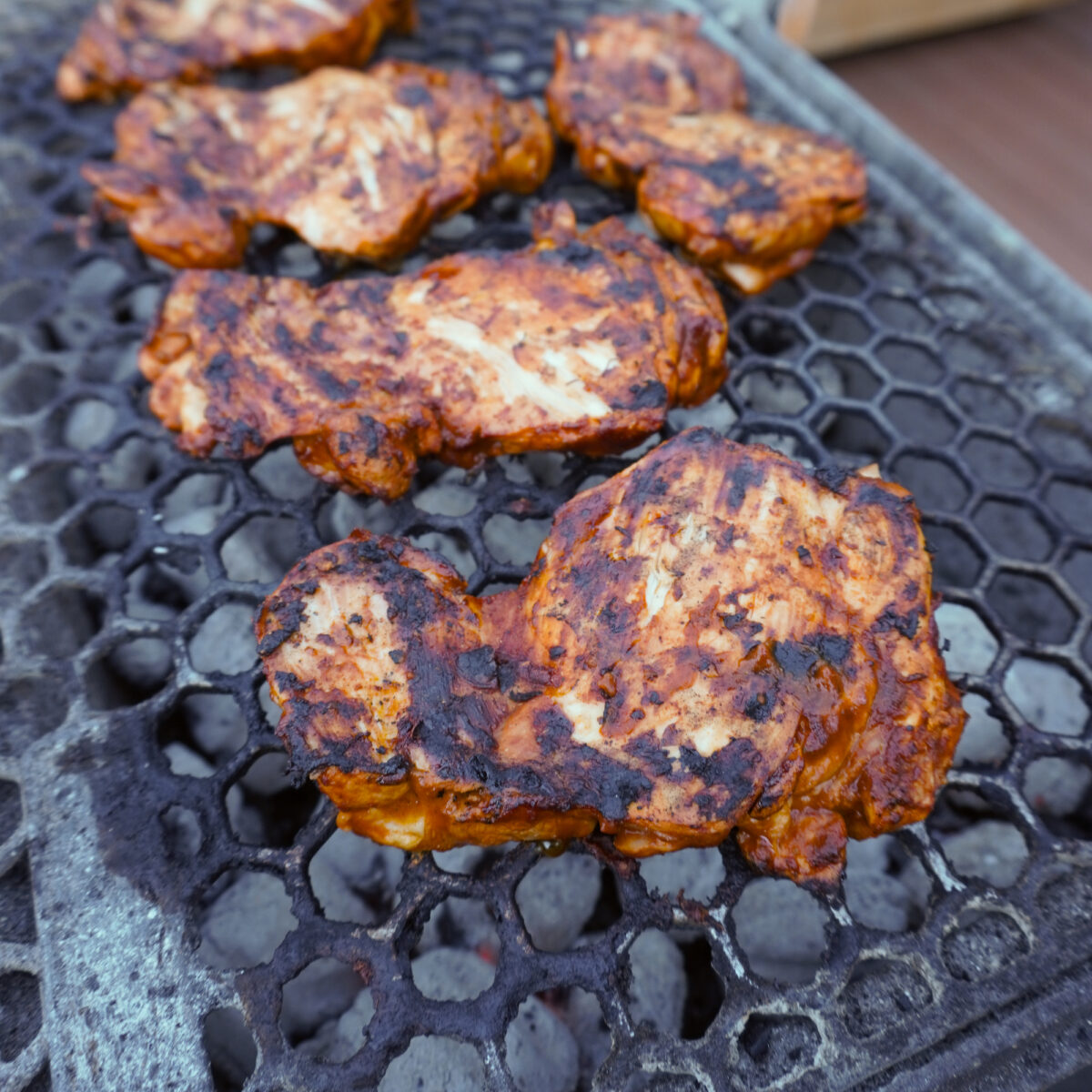 Grilled Chipotle Chicken Copycat on grill.