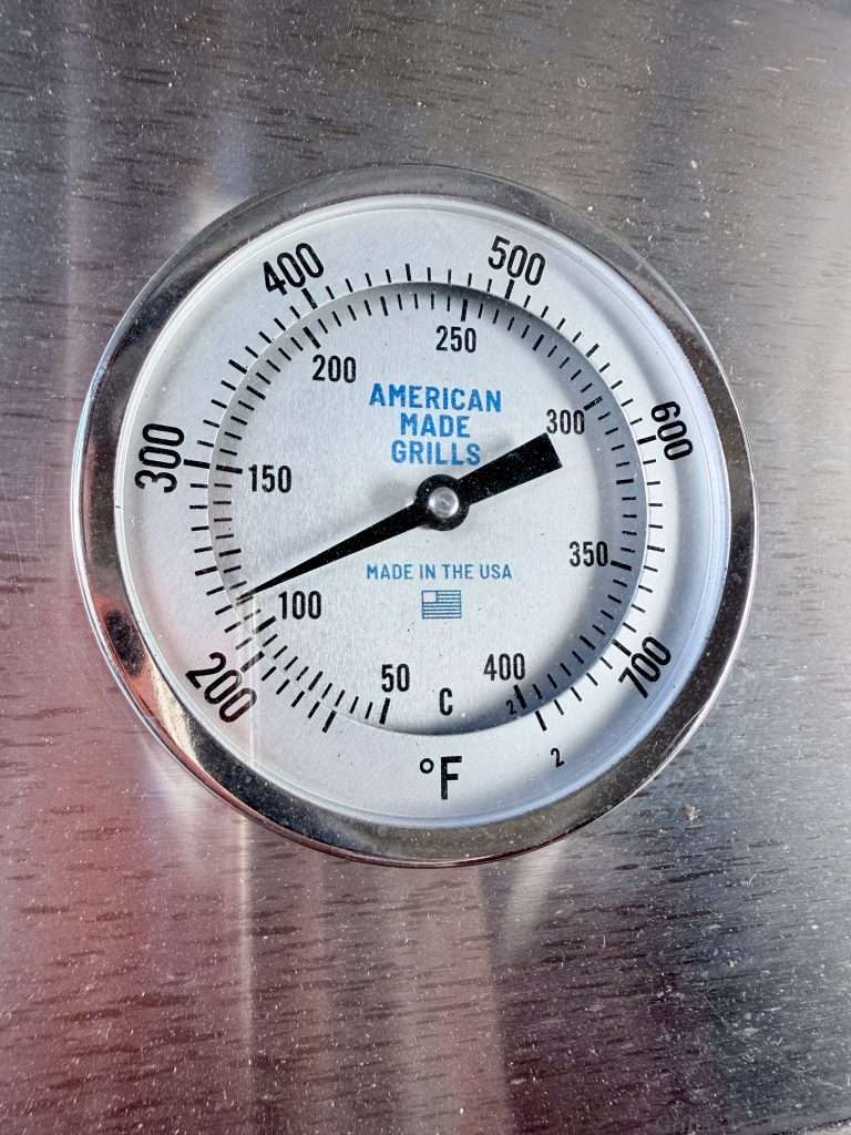 The temp gauge on the American Made Grills sitting around 235F