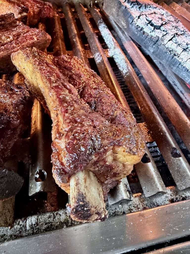The bone sticking out on a beef rib as the meat contracts after a couple hours on the grill