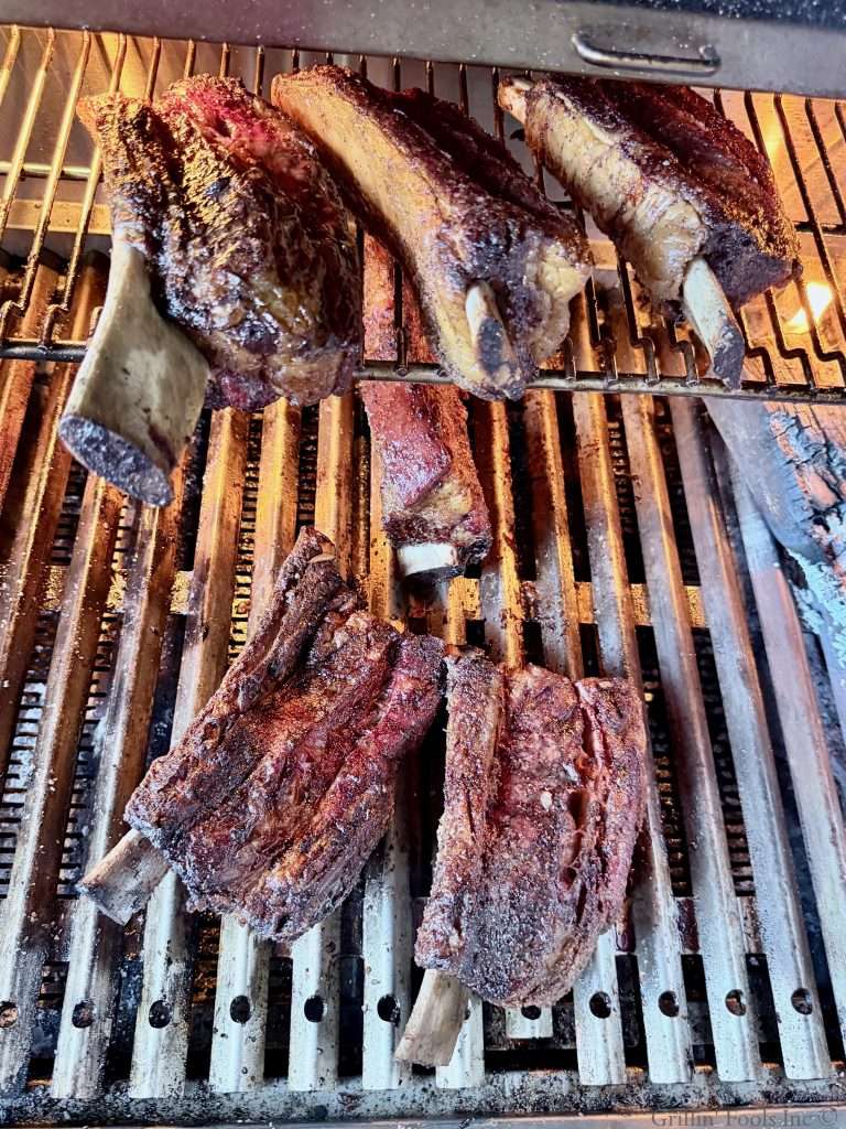 Six beef ribs after cooking about 5 hours on the grill