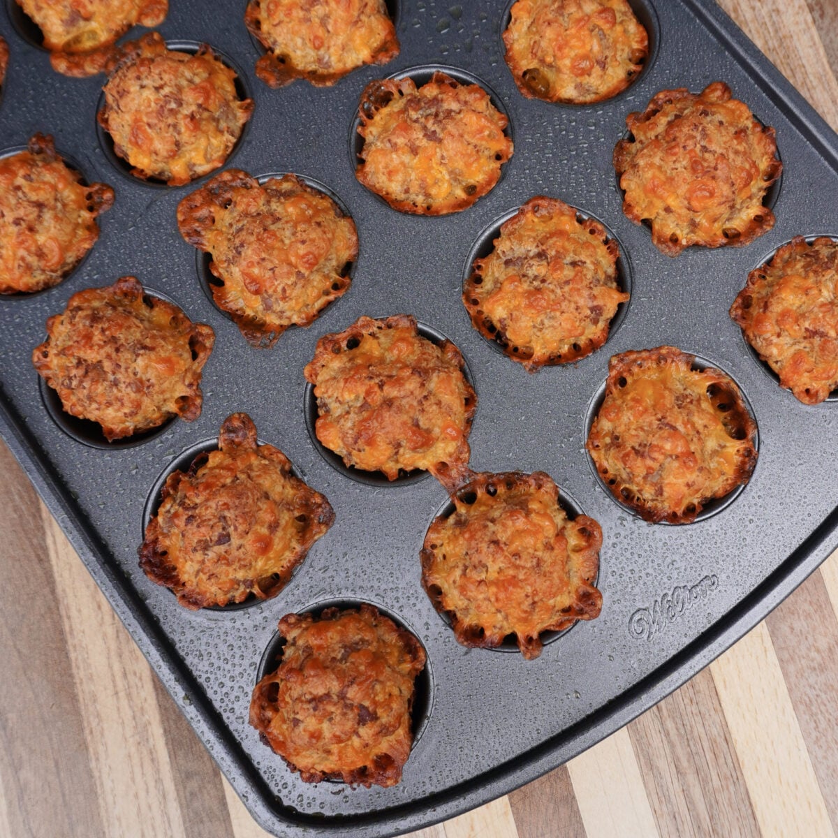 smoked sausage balls in mini muffin pan.