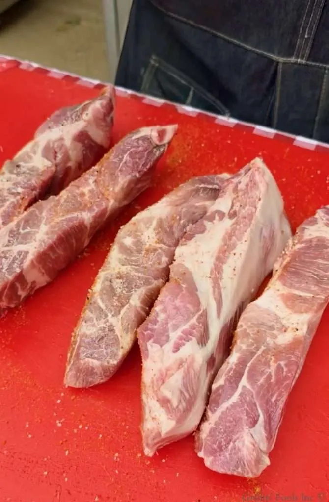 Five well marbled fingers of pork butt otherwise known as country style ribs