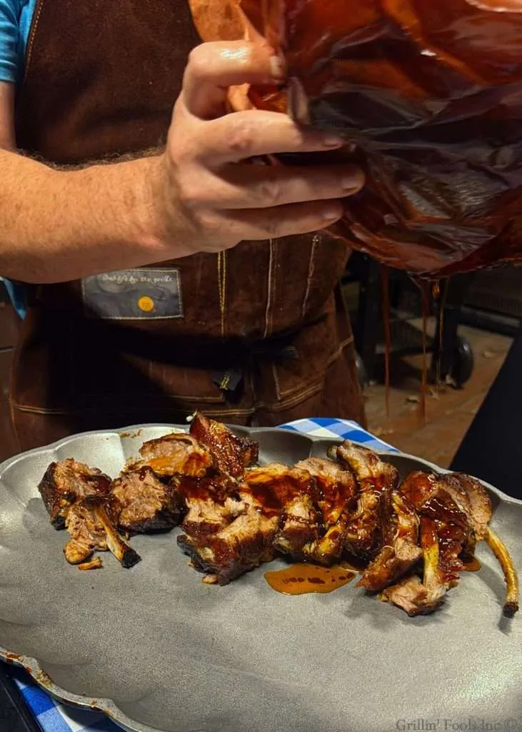 Drizzling over an apple butter slurry over the top of slice baby back ribs